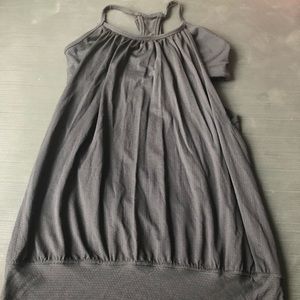 Black Lululemon No Limits tank with attached  bra.